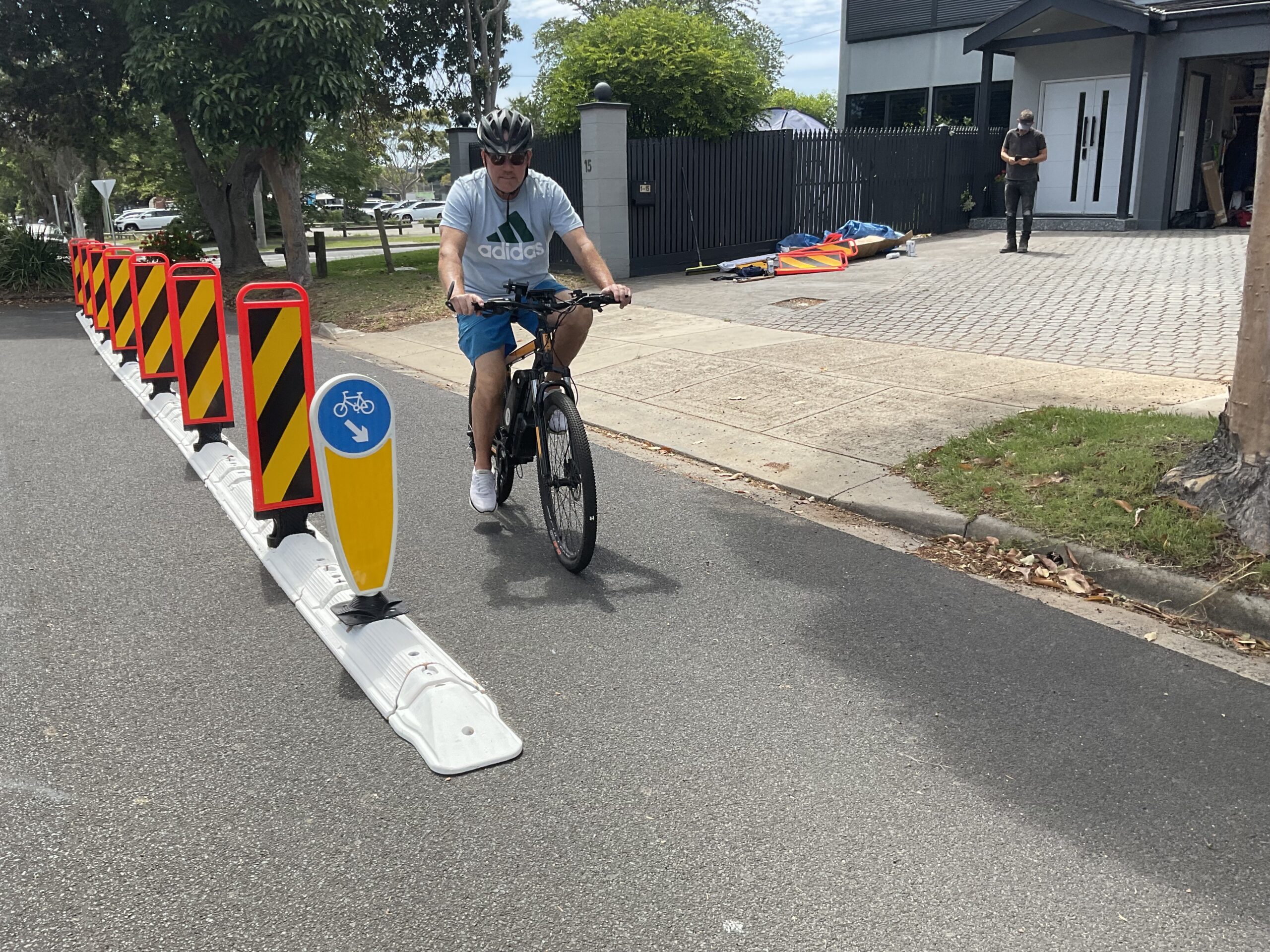 Adam on bicycle with cycle safety